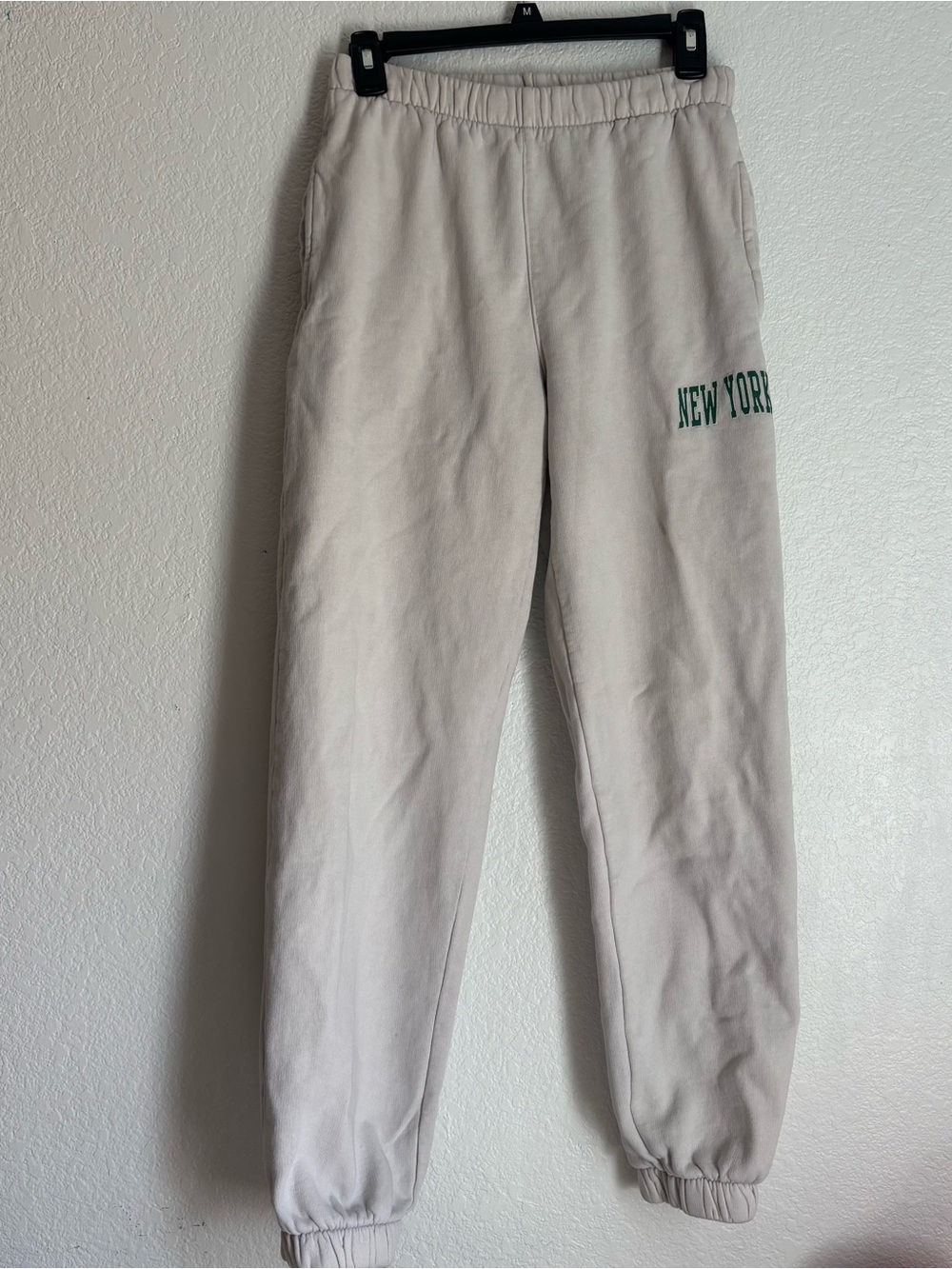 Brandy Melville Cream Sweatpants with Green "New York" Print